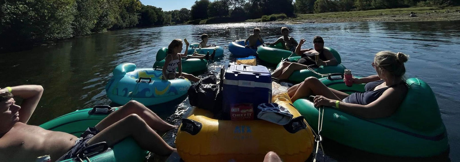 People Floating On River