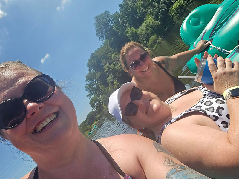 People On Tubes On Water